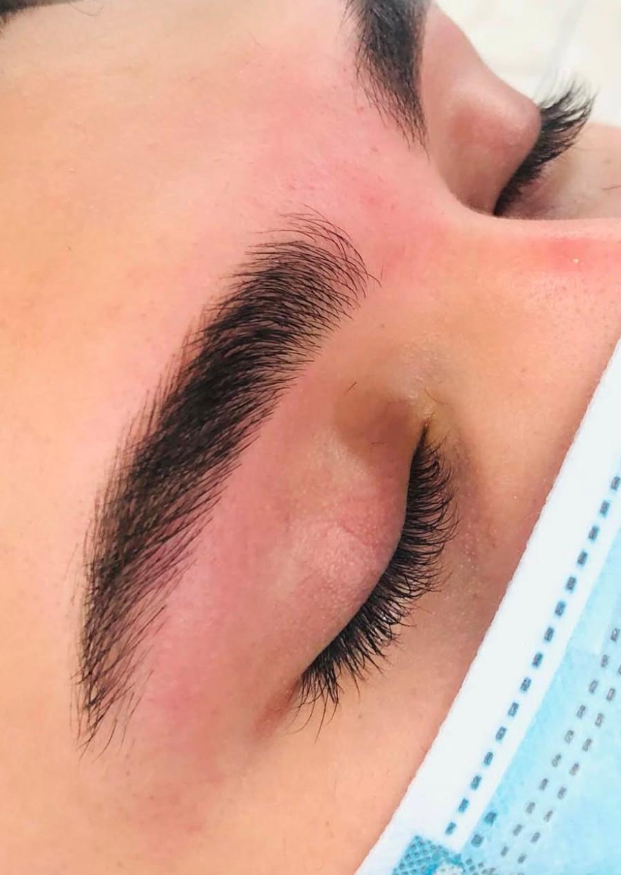 Close-up of flawlessly threaded eyebrow
